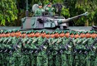 Ilustrasi pasukan TNI berlatar tank Yonkav Kostrad. (Foto: Dok. Puspen TNI)