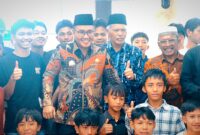 Poto Walikota sungai Penuh Alfin dan wakil walikota Azhar Hamzah bersama anak yatim piatu